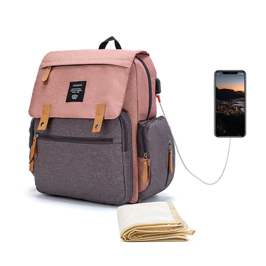 LEQUEEN large capacity multifunctional mummy bag for carrying diapers, bottles, clothes, toys, and other baby essentials.