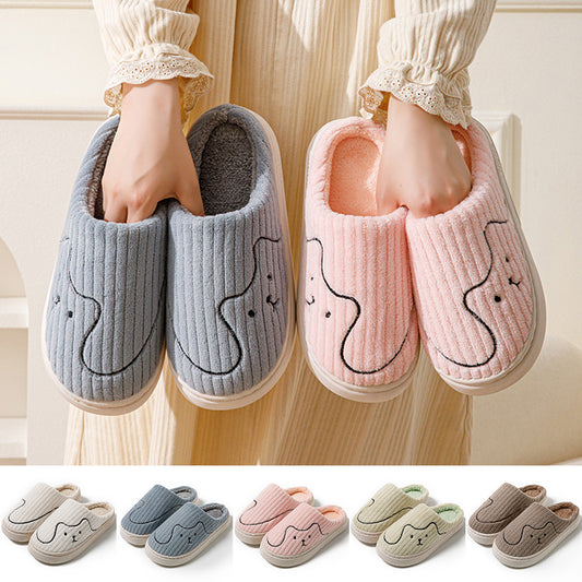 Striped cat plush slippers for women and men with warm soft lining and non-slip soles for indoor home wear.